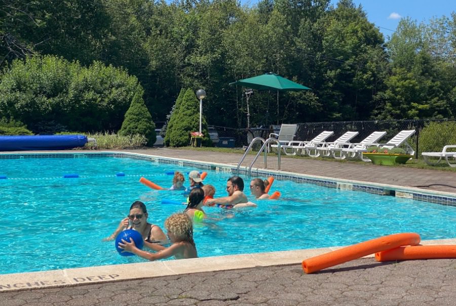 Kids and Adults in Pool at High Ridge Club